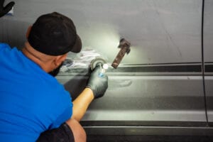 Fort Worth Auto Body Repair- action photo- dent removal